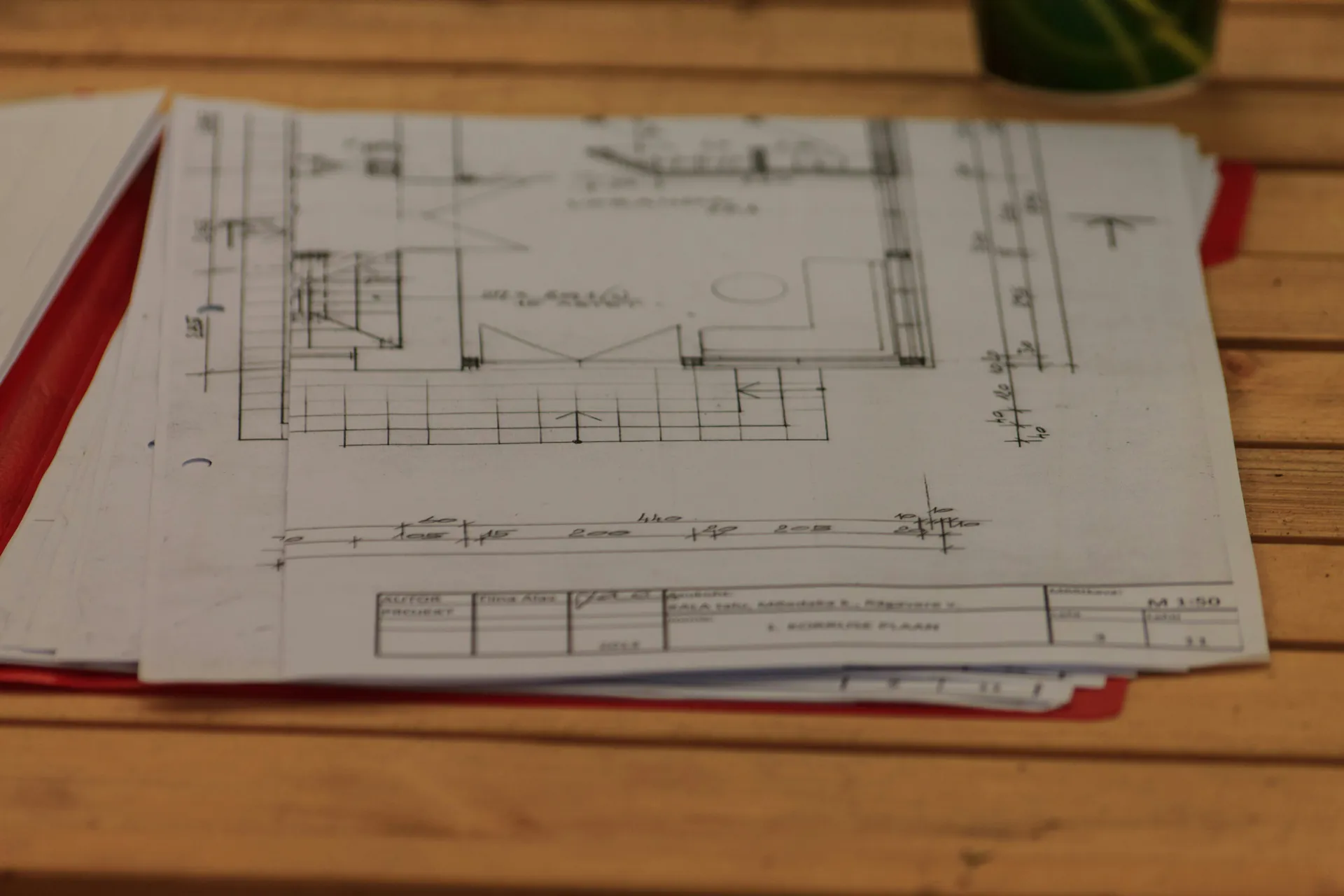 Technical planning documents for energy projects on one table